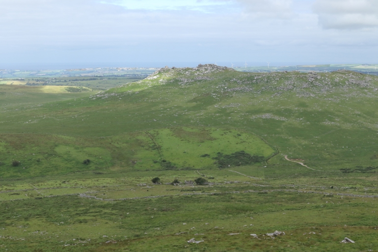 Rough Tor from Brown Willy. The ruins and fields in the foreground are medieval but those on the left slope of Rough Tor are older.