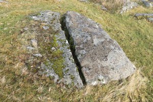 Granite slab cut with chisel but then left in situ